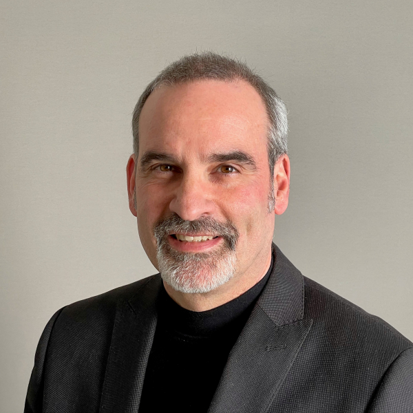 Dr. Carl Stauffer IofC